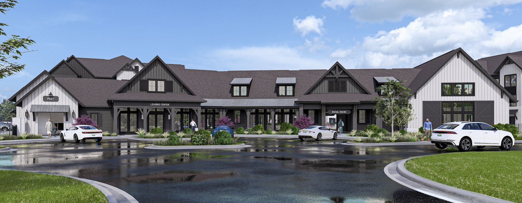 a building with a large driveway and cars