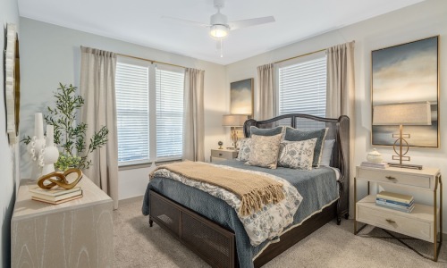 Plush beige broadloom carpet (Mohawk Revive, Havana) in a Portier Midtown bedroom